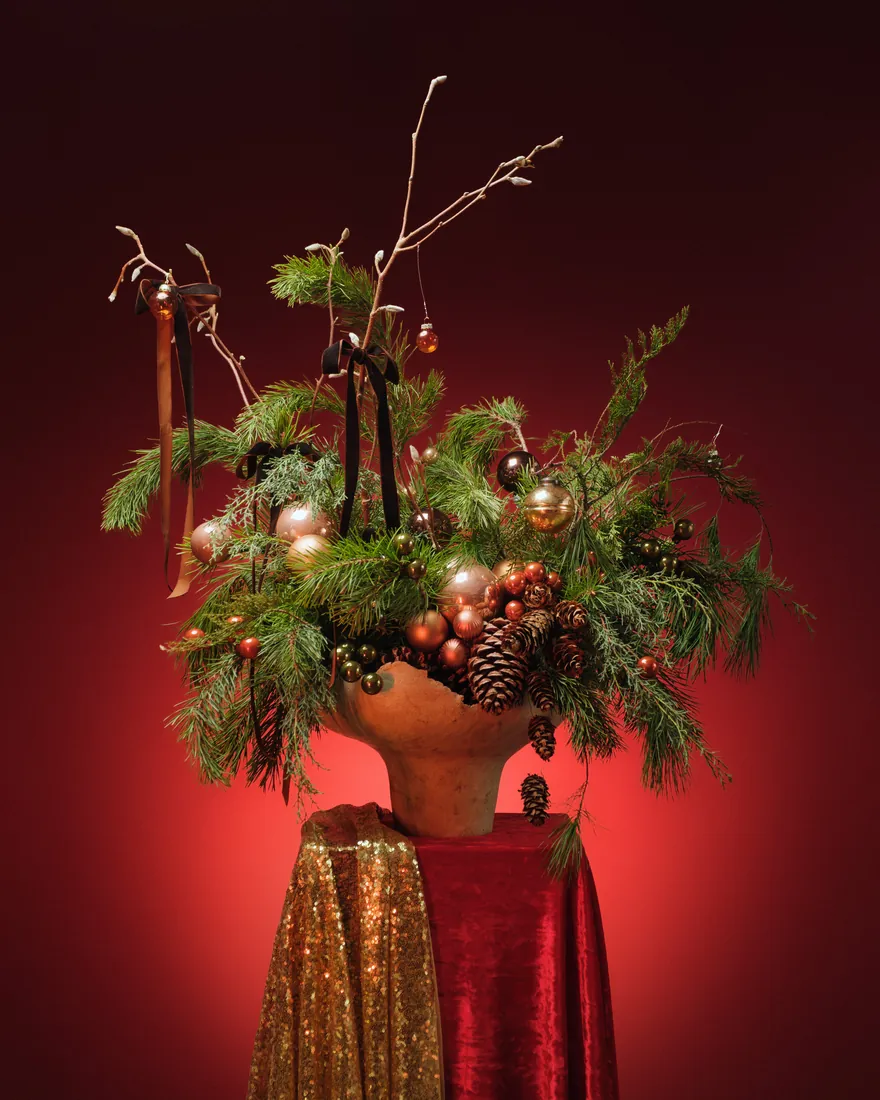 Christmas arrangement in a designer planter