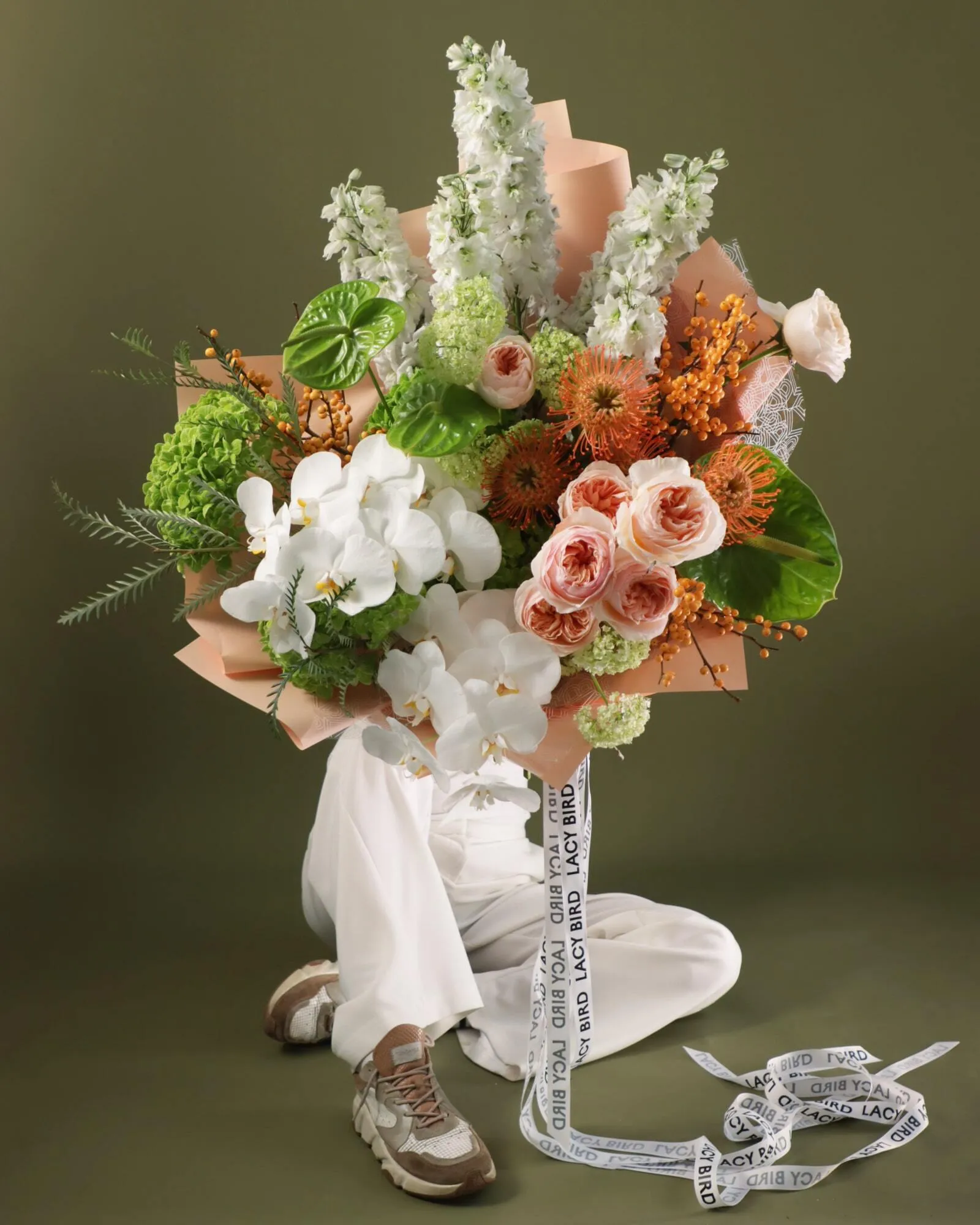 Large Lacy Bird style bouquet with orchids, roses and delphinium